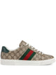 Gucci Men's Gucci Ace Low-Top Sneakers In Beige Gg Supreme Canvas With Signature Green And Red Web Stripes.