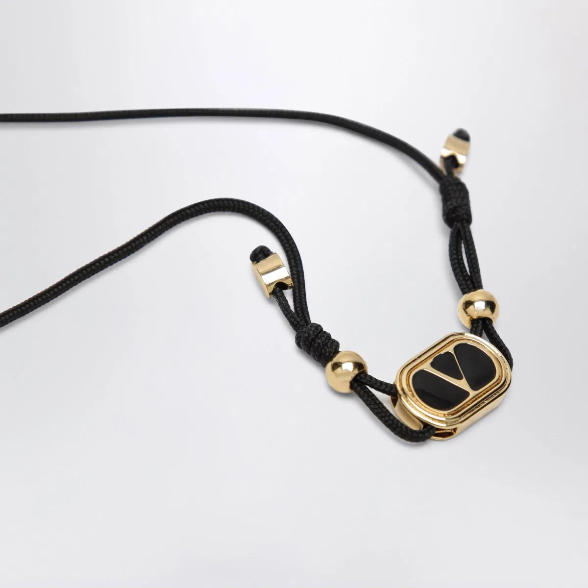 Valentino Garavani Black Cord Bracelet With Enamelled Gold 
